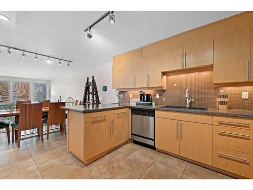 104-350 4 Avenue Ne, Calgary, AB - Indoor Photo Showing Kitchen With Stainless Steel Kitchen