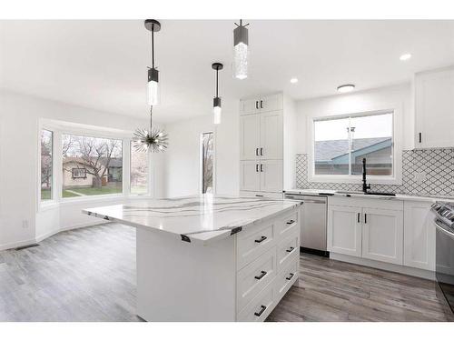 1807 Summerfield Boulevard Se, Airdrie, AB - Indoor Photo Showing Kitchen With Upgraded Kitchen