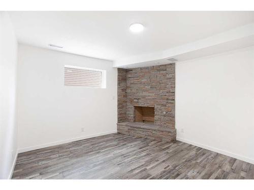 1807 Summerfield Boulevard Se, Airdrie, AB - Indoor With Fireplace