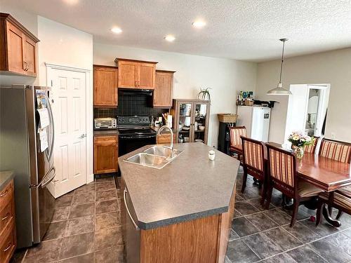 956 Prestwick Circle Se, Calgary, AB - Indoor Photo Showing Kitchen With Double Sink