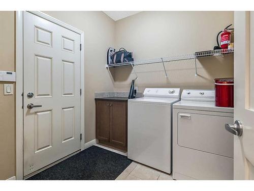 102 Auburn Glen Circle Se, Calgary, AB - Indoor Photo Showing Laundry Room