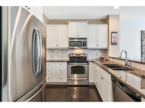 102 Auburn Glen Circle Se, Calgary, AB - Indoor Photo Showing Kitchen With Double Sink