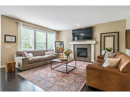 102 Auburn Glen Circle Se, Calgary, AB - Indoor Photo Showing Living Room With Fireplace