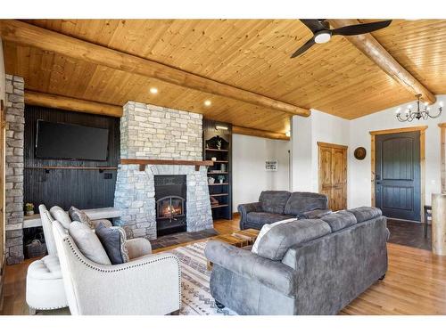 54004 Township Road 252, Rural Rocky View County, AB - Indoor Photo Showing Living Room With Fireplace