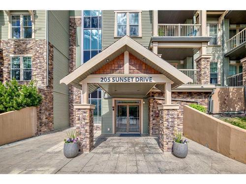 117-205 Sunset Drive, Cochrane, AB - Outdoor With Balcony