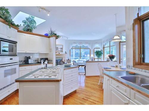 72 Hamptons Drive Nw, Calgary, AB - Indoor Photo Showing Kitchen With Double Sink