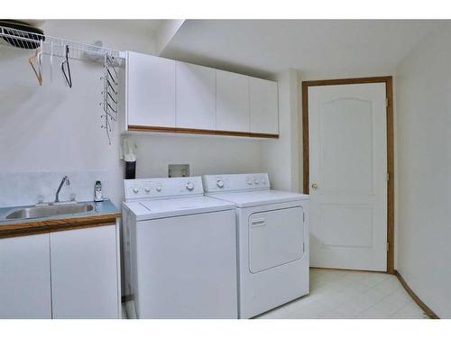 72 Hamptons Drive Nw, Calgary, AB - Indoor Photo Showing Laundry Room