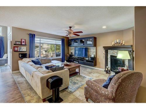 221 Kincora Heights Nw, Calgary, AB - Indoor Photo Showing Living Room With Fireplace