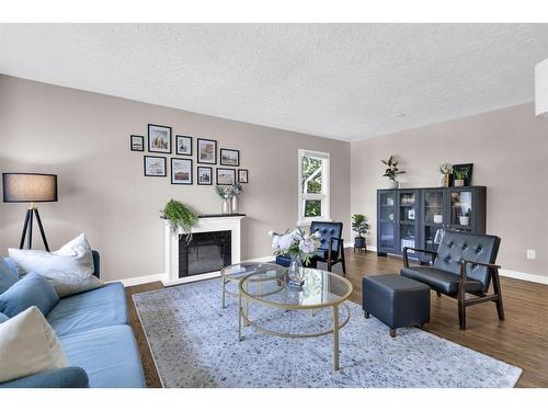 1703 31 Street Sw, Calgary, AB - Indoor Photo Showing Living Room With Fireplace