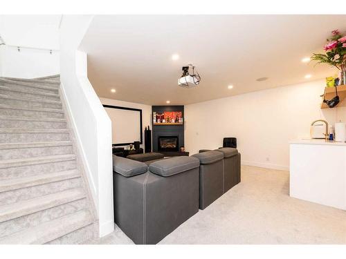 2 Prestwick Rise Se, Calgary, AB - Indoor With Fireplace