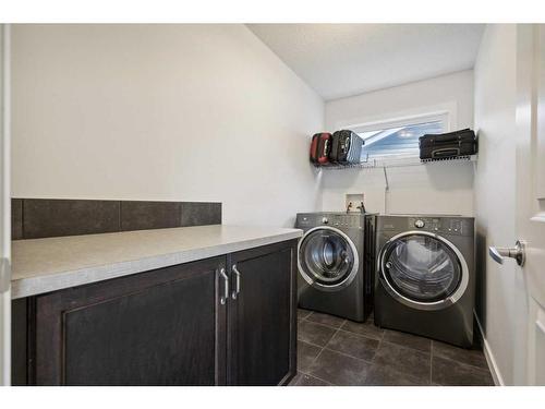 52 Cougar Ridge Manor Sw, Calgary, AB - Indoor Photo Showing Laundry Room