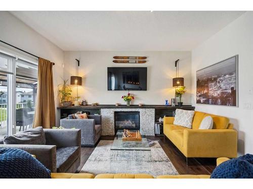 52 Cougar Ridge Manor Sw, Calgary, AB - Indoor Photo Showing Living Room