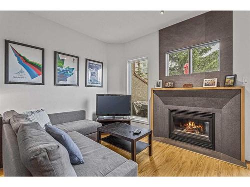 114-901 Benchlands Trail, Canmore, AB - Indoor Photo Showing Living Room With Fireplace