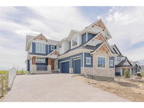 60 Junegrass Terrace, Rural Rocky View County, AB - Outdoor With Facade