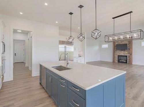 60 Junegrass Terrace, Rural Rocky View County, AB - Indoor Photo Showing Kitchen With Upgraded Kitchen