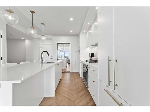 711-8505 Broadcast Avenue Sw, Calgary, AB - Indoor Photo Showing Kitchen With Upgraded Kitchen