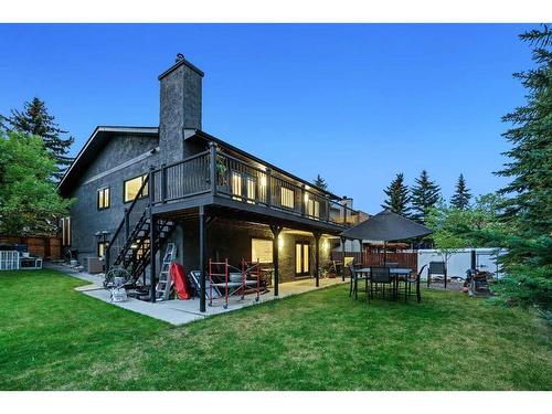 19 Hawkslow Bay Nw, Calgary, AB - Outdoor With Deck Patio Veranda With Backyard With Exterior