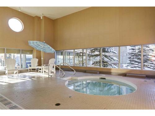 802-99 Spruce Place Sw, Calgary, AB - Indoor Photo Showing Other Room With In Ground Pool