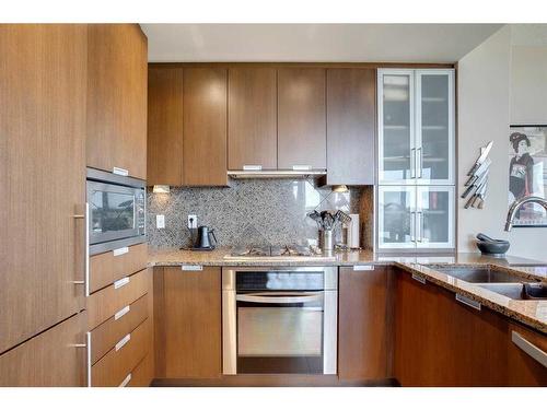 802-99 Spruce Place Sw, Calgary, AB - Indoor Photo Showing Kitchen With Double Sink With Upgraded Kitchen