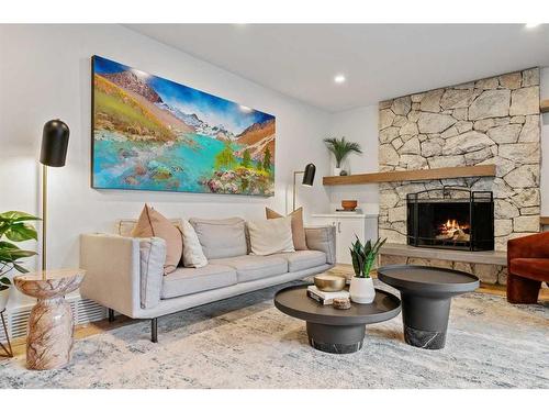 12320 Lake Moraine Rise Se, Calgary, AB - Indoor Photo Showing Living Room With Fireplace