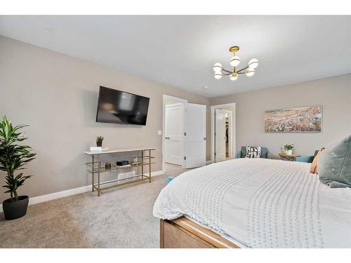 12320 Lake Moraine Rise Se, Calgary, AB - Indoor Photo Showing Bedroom