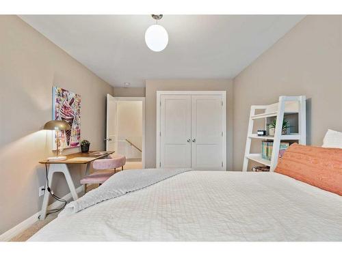 12320 Lake Moraine Rise Se, Calgary, AB - Indoor Photo Showing Bedroom