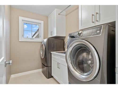 12320 Lake Moraine Rise Se, Calgary, AB - Indoor Photo Showing Laundry Room