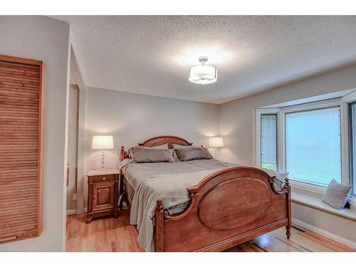 323 Silver Valley Boulevard Nw, Calgary, AB - Indoor Photo Showing Bedroom