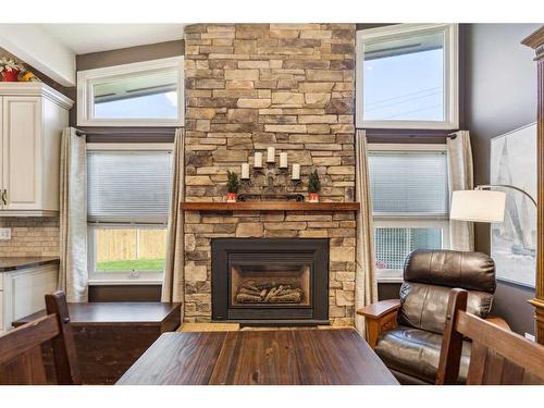 12 Lake Newell Green Se, Calgary, AB - Indoor Photo Showing Living Room With Fireplace