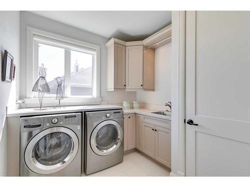 210 Fortress Bay Sw, Calgary, AB - Indoor Photo Showing Laundry Room