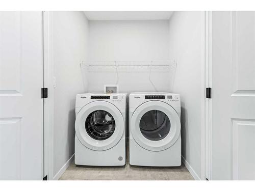 71 Aquila Way Nw, Calgary, AB - Indoor Photo Showing Laundry Room