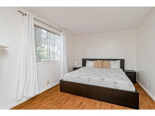 119 Erin Mount Crescent Se, Calgary, AB - Indoor Photo Showing Bedroom
