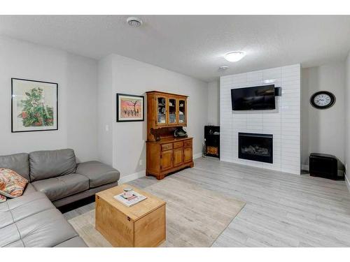 51 Nolancliff Place Nw, Calgary, AB - Indoor Photo Showing Living Room With Fireplace