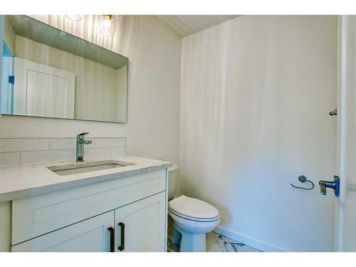 99 Strandell Crescent Sw, Calgary, AB - Indoor Photo Showing Bathroom