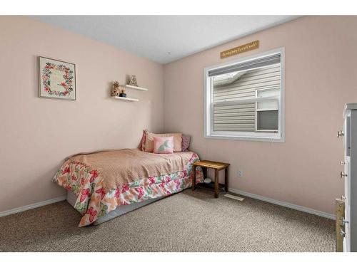 218 Sagewood Drive Sw, Airdrie, AB - Indoor Photo Showing Bedroom