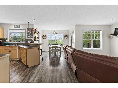 218 Sagewood Drive Sw, Airdrie, AB - Indoor Photo Showing Living Room With Fireplace