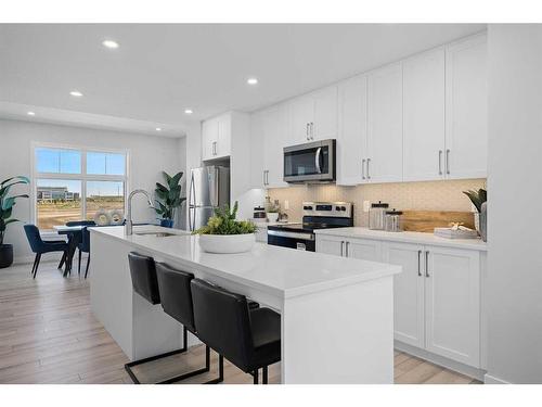 215 Les Jardins Park Se, Calgary, AB - Indoor Photo Showing Kitchen With Stainless Steel Kitchen With Upgraded Kitchen