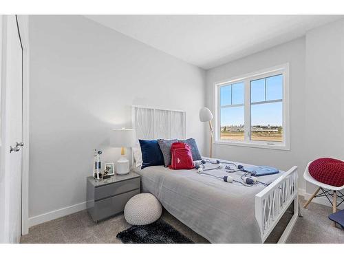 215 Les Jardins Park Se, Calgary, AB - Indoor Photo Showing Bedroom