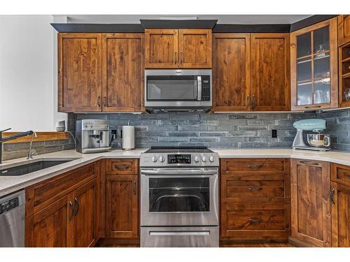 211-75 Dyrgas Gate, Canmore, AB - Indoor Photo Showing Kitchen