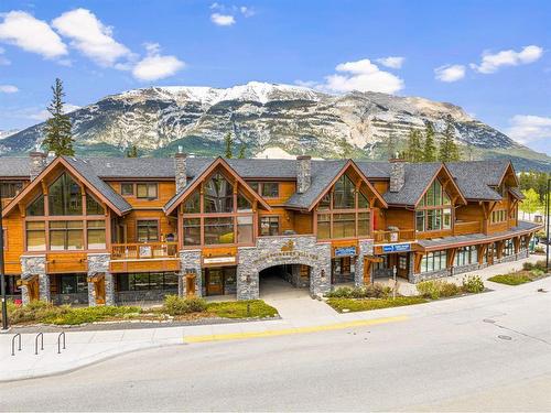 211-75 Dyrgas Gate, Canmore, AB - Outdoor With Deck Patio Veranda With Facade