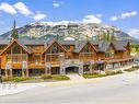 211-75 Dyrgas Gate, Canmore, AB  - Outdoor With Deck Patio Veranda With Facade 