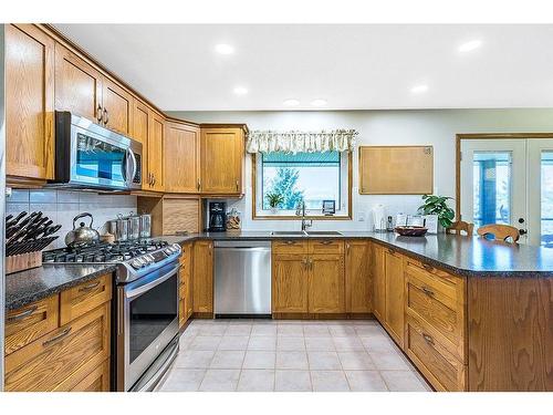 434102 64 Street West, Rural Foothills County, AB - Indoor Photo Showing Kitchen With Double Sink