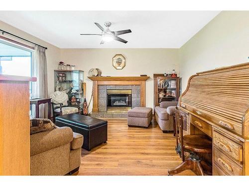 434102 64 Street West, Rural Foothills County, AB - Indoor Photo Showing Living Room With Fireplace