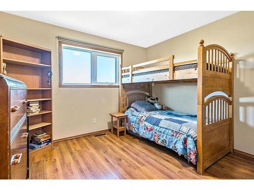 434102 64 Street West, Rural Foothills County, AB - Indoor Photo Showing Bedroom