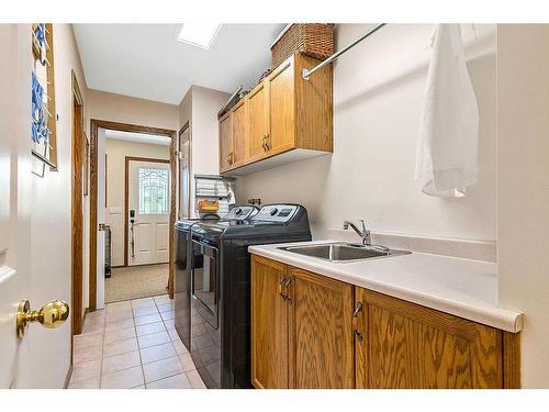 434102 64 Street West, Rural Foothills County, AB - Indoor Photo Showing Laundry Room