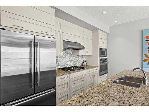 68 Victoria Cross Boulevard Sw, Calgary, AB - Indoor Photo Showing Kitchen With Double Sink With Upgraded Kitchen