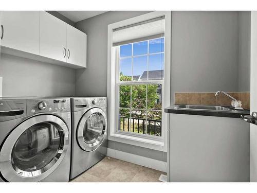 68 Victoria Cross Boulevard Sw, Calgary, AB - Indoor Photo Showing Laundry Room