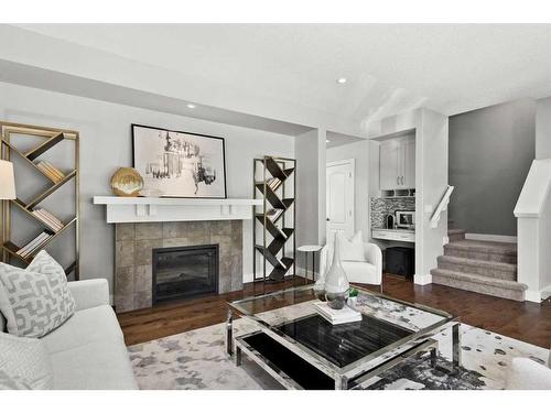 68 Victoria Cross Boulevard Sw, Calgary, AB - Indoor Photo Showing Living Room With Fireplace