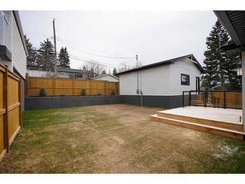 16 Calandar Road Nw, Calgary, AB - Outdoor With Deck Patio Veranda With Exterior