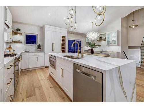 16 Calandar Road Nw, Calgary, AB - Indoor Photo Showing Kitchen With Double Sink With Upgraded Kitchen